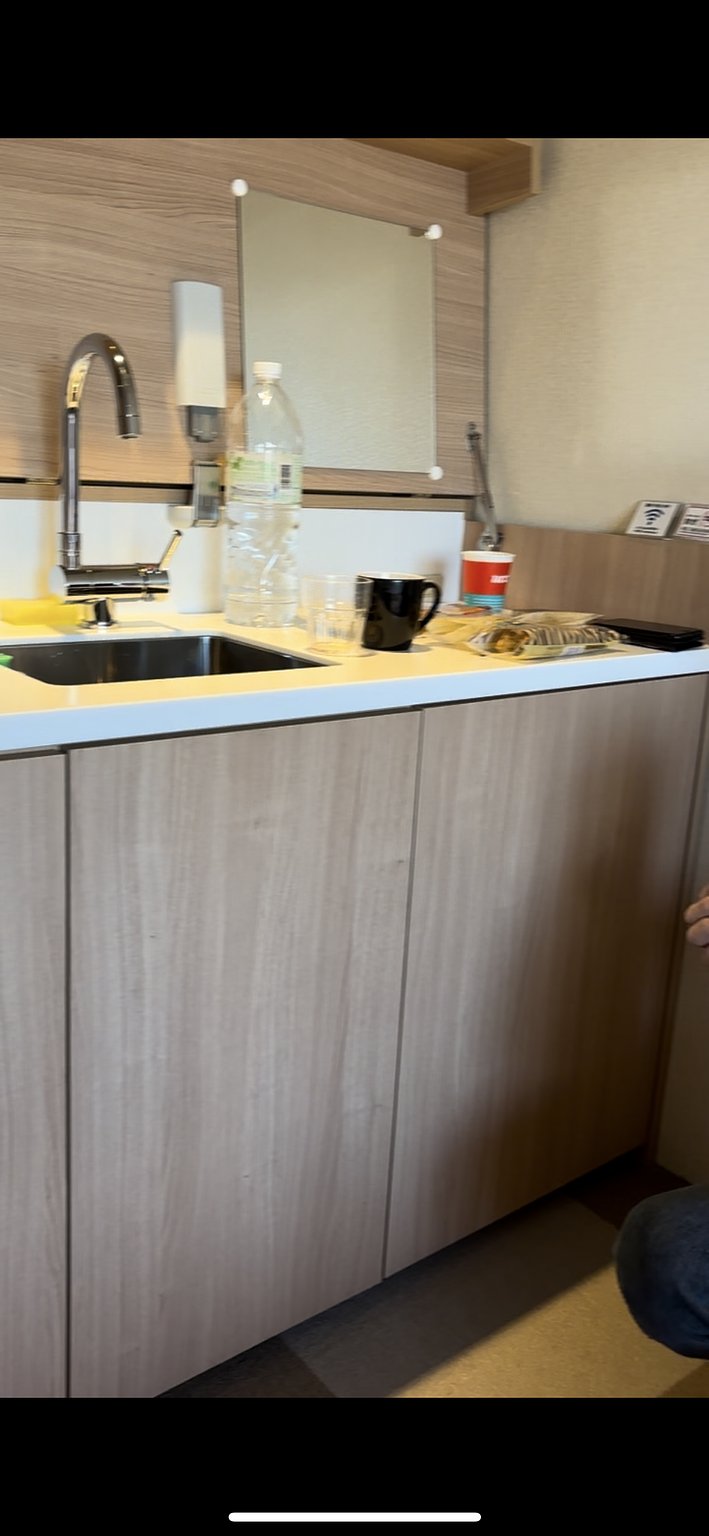 Having a kitchen in the room was great for families with children!