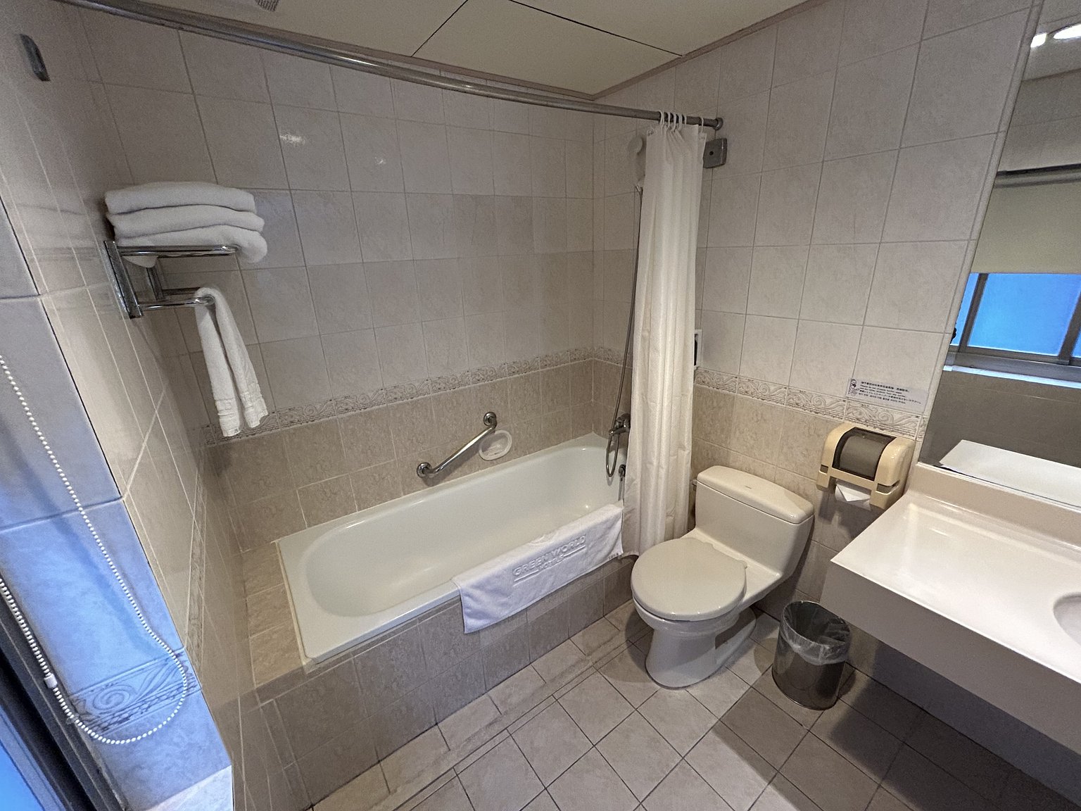 A girls' trip in Taipei with a spacious room and a convenience store next door